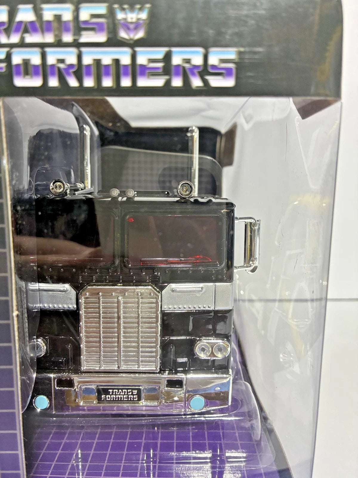 Transformers G1 Decepticon Nemesis Prime 1:24 Scale Diecast — Hollywood Rides — Jada Toys — with Robot on Chassis